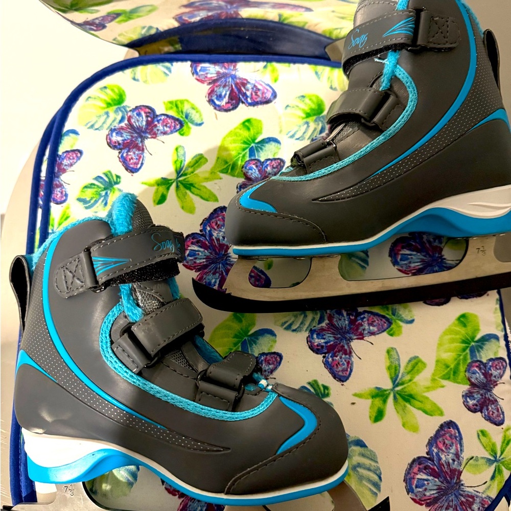 Riedell Soar Youth Ice Skates Size 12J Gray/ Turquoise
Blade covers included